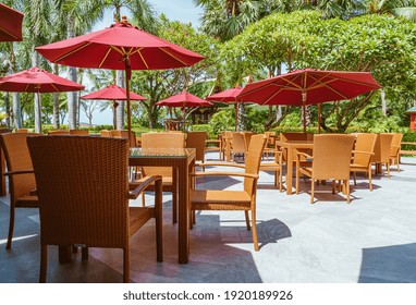 Empty Outdoor Patio Table And Chair With Umbrella