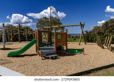 Empty Outdoor Playground Structure Under Bright Sky