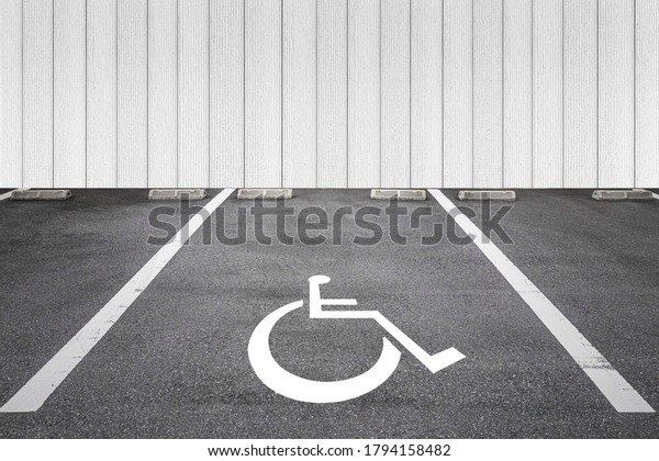 Empty outdoor\
public parking for the\
disabled