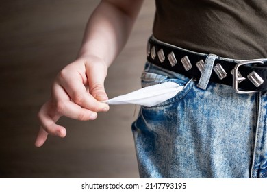 An Empty Pants Pocket And A Symbolic Sign Of Poverty And Vagrancy, Only In An Apartment Without Money.