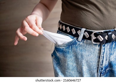 An Empty Pants Pocket And A Symbolic Sign Of Poverty And Vagrancy, Only In An Apartment Without Money.