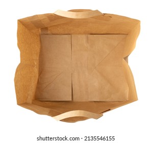 Empty Paper Bag Top View. Brown Shopping Package Mockup, Ecological Consumption Concept, Open Bag Isolated on White Background - Powered by Shutterstock