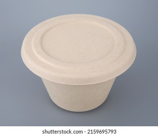 Empty Paper Bowl Isolated On Gray Background. Container For Food