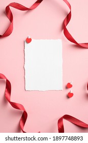 Empty Paper Card And Red Ribbon On Pink Background. Valentine Day Greeting Card Mockup, Gift Voucher, Brochure, Story Design On Social Media