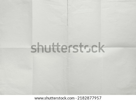 Empty paper folded in eight, texture background