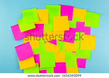 Empty paper note on blue background with copy space for text. FAQ( frequency asked questions), Answer, Q&A, Communication and Brainstorming, International Ask a Question day Concepts