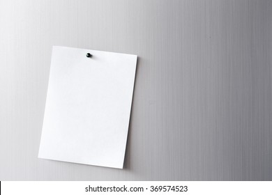 Empty Paper Sheet On Refrigerator Door. Paper Note With Magnet