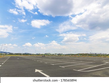 Empty Parking Lot With Blue Skies