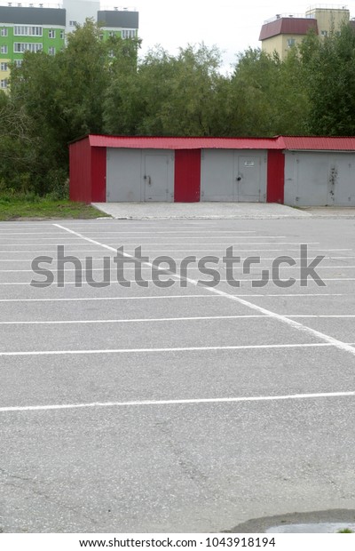 Empty parking for cars, free seats. Summer and autumn\
background 