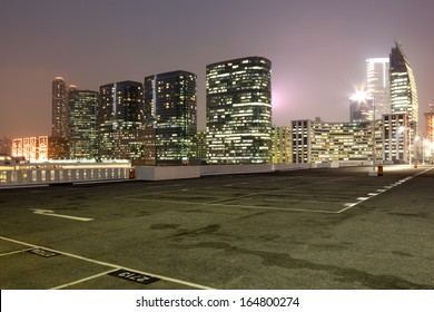 Empty Parking Lot In The City At Night