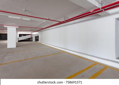 Empty Parking Garage Underground Interior In Apartment Or Business Building Office