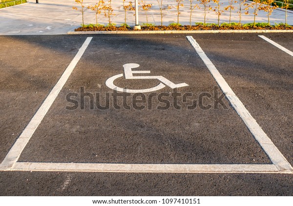 Empty parking lot,\
handicap parking.