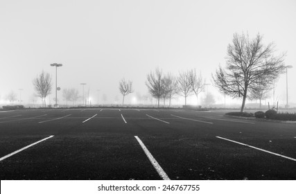 Empty Parking Lot At Night With Heavy Fog