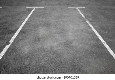 Empty Parking Place With White Marking Lines On Asphalt