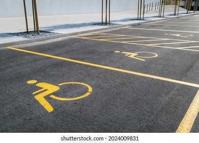 Empty parking spot for disabled wheelchair persons.