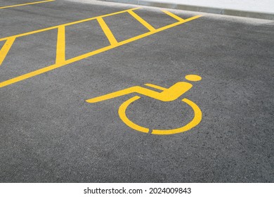 Empty Parking Spot For Disabled Wheelchair Persons.