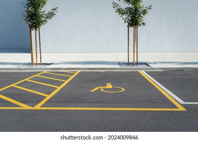 Empty Parking Spot For Disabled Wheelchair Persons.