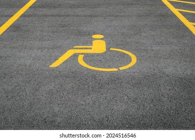 Empty Parking Spot For Disabled Wheelchair Persons.