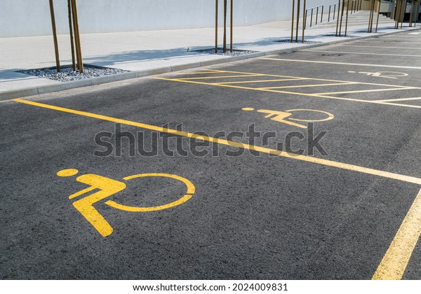 Empty\
parking spot for disabled wheelchair\
persons.