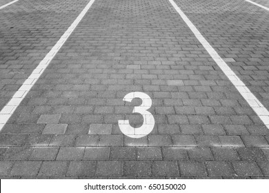 Empty Parking Spot With A Number