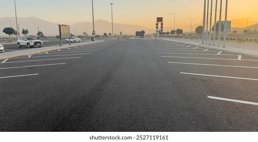 An empty parking lot at sunset