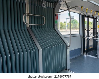 empty passenger bus interior, front view