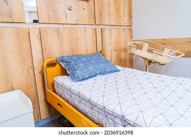 Empty Patient Beds In A Maternity Ward. Modern Light Ward Of Maternity Hospital. Mother And Child Bed