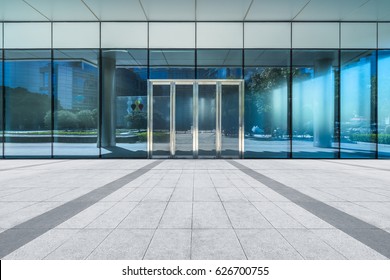 Empty Pavement Front Of Office Entrance
