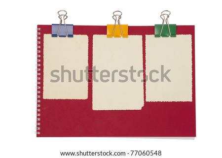  Empty photo on red notepad with binderclip. Isolated on white background \ Empty photo on red notepad