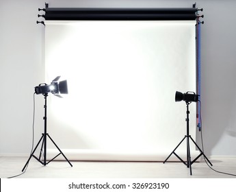 Empty Photo Studio With Lighting Equipment