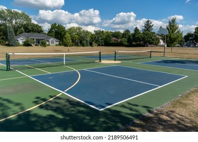 Empty Pickleball court blue and green recreational sport at an outdoor park. - Shutterstock ID 2189506491