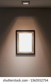 Empty Picture Frame On Wall With Spotlight For Certificate Display, Blank White Space