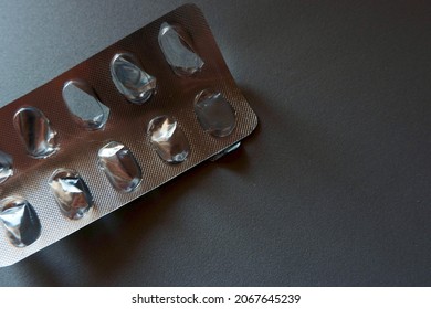 Empty Pill Blister Package On Grey Background. Concepts Of Drug Shortage And Death