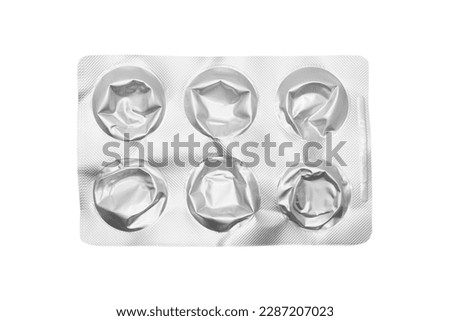 Empty pills of blister pack isolated on white background. Empty silver blister. Used blister pill. Empty blister pack from drugs.