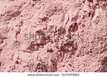 Empty pink background made of whey protein powder