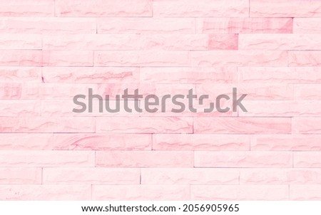 Empty Pink brick wall texture background in the bedroom at lovely. Brickwork stonework interior, rock old clean concrete grid uneven abstract weathered brick design, horizontal architecture wallpaper.