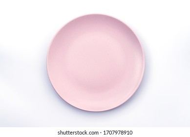 Empty Pink plate isolated on white background top view