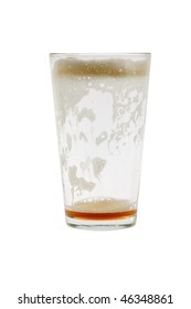 Empty Pint Glass With Foam On White Background