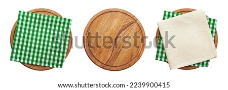 Empty pizza board and napkins top view isolated on white.