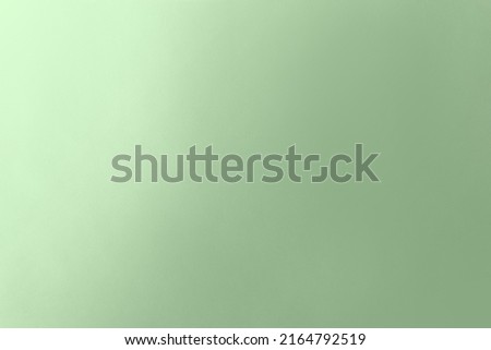 Empty Plain soft pale green color gradation on recyclable paper texture minimalism peaceful background concept