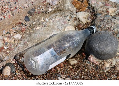 empty plasic bottle on the beach
