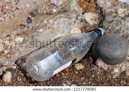 empty plasic bottle on the beach