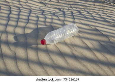 empty plastic bottle on beach