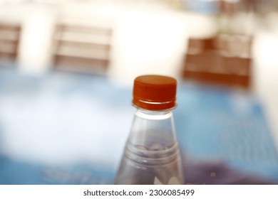 an empty plastic bottle on the table