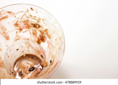 Empty Plastic Cup With Remains Of Ice Cream 
