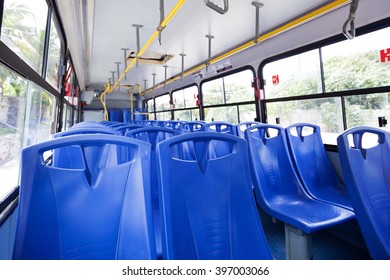 Empty Plastic Seats Inside Public City Bus, Nobody