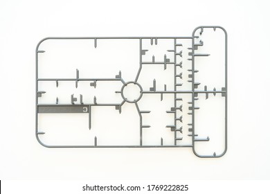 Empty Plastic Sprue Or Model Kit Assembly Toy Injection Molding Set After Cut Part On White Background