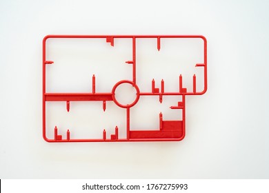 Empty Plastic Sprue Part Or Model Kit Assembly Toy Injection Molding Set After Cut Part On White Background