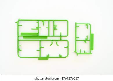 Empty Plastic Sprue Part Or Model Kit Assembly Toy Injection Molding Set After Cut Part On White Background