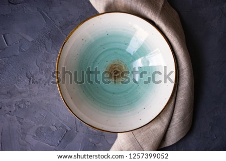 Similar – empty old soup plate with spoon on old wooden background